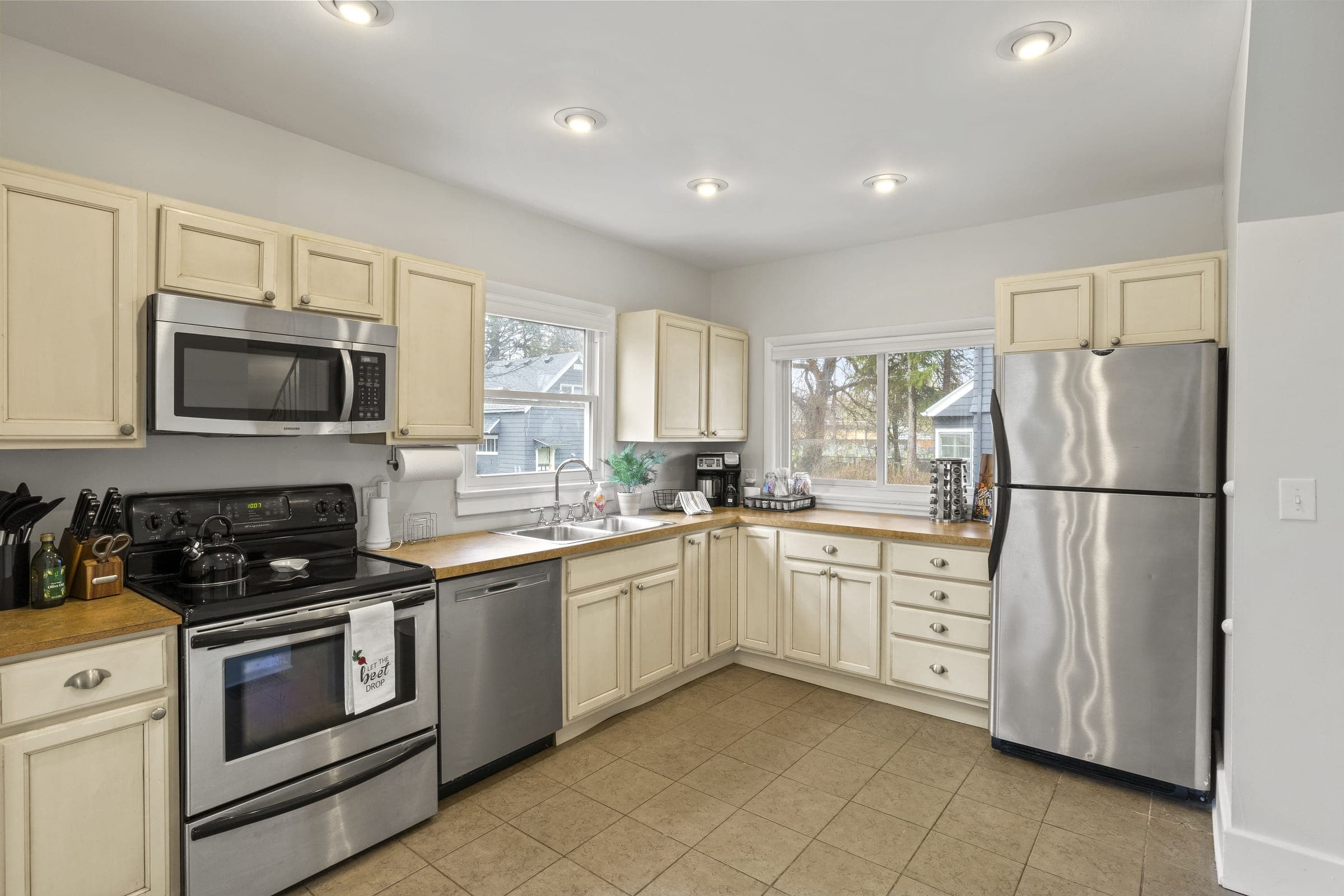 Full kitchen with stainless steel appliances